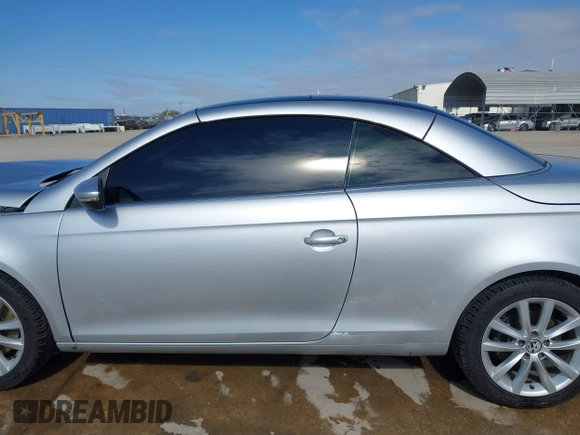 2012 Volkswagen Eos Komfort with VIN WVWBW7AH5CV005738, listed as a IAAI auction lot 41619744 with 131,340 mi miles and . Bid and sale history available at DreamBid. Image 15.