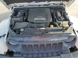 2015 Jeep Wrangler Unlimited Sahara with VIN 1C4BJWEG0FL649724, listed as a Copart auction lot 82189494 with 84,161 mi miles and Salvage Title. Bid and sale history available at carsss.com. Image 11.