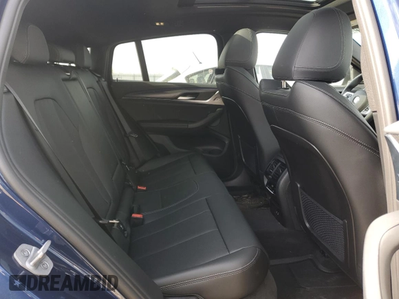 2025 BMW X4 xDrive30i with VIN 5UX33DT05S9Y19798, listed as a Copart auction lot 51861845 with 718 mi miles and Salvage Title. Bid and sale history available at carsss.com. Image 11.