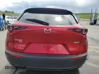 2023 Mazda CX-30 S Carbon Edition with VIN 3MVDMBCM7PM551693, listed as a Copart auction lot 60330865 with 22,557 mi miles and Salvage title. Bid and sale history available at DreamBid. Image 6.