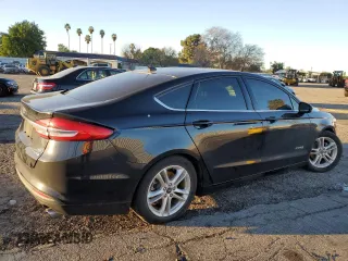 2018 Ford Fusion Hybrid SE with VIN 3FA6P0LU8JR211748, listed as a Copart auction lot 38046363 with 76,044 mi miles. Bid and sale history available at carsss.com. Image 3.