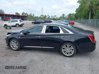 2019 Cadillac XTS Luxury with VIN 2G61M5S33K9115359, listed as a IAAI auction lot 42612026 with 246,165 mi miles and . Bid and sale history available at DreamBid. Image 14.