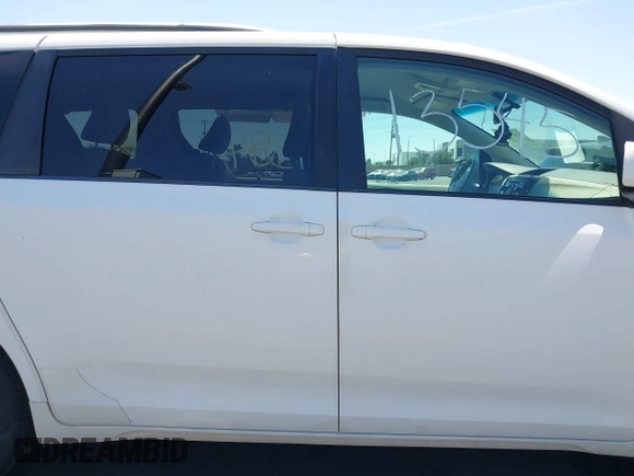 2012 Toyota Sienna LE AAS with VIN 5TDKK3DC4CS183817, listed as a IAAI auction lot 42013545 with 207,822 mi miles. Bid and sale history available at carsss.com. Image 13.