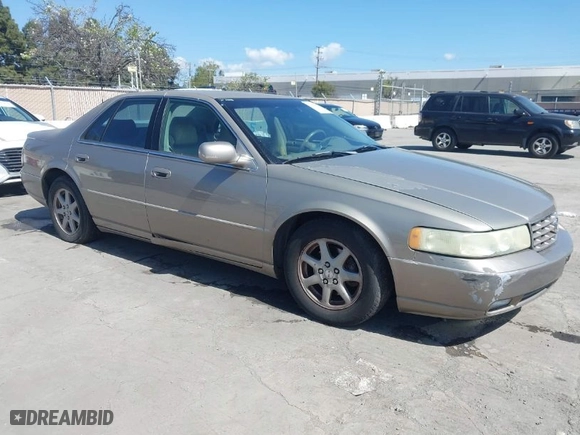 2002 Cadillac Seville Luxury SLS with VIN 1G6KS54Y92U207873, listed as a IAAI auction lot 41957595 with 118,580 mi miles. Bid and sale history available at carsss.com. Image 1.