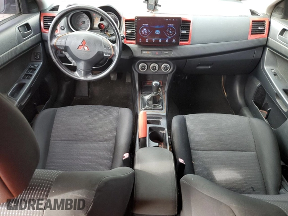 2009 Mitsubishi Lancer ES with VIN JA3AU26U49U002269, listed as a Copart auction lot 73992004 with 144,134 mi miles and Salvage Title. Bid and sale history available at DreamBid. Image 8.