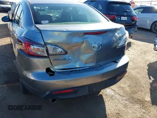 2010 Mazda 3 i SV with VIN JM1BL1SF6A1142565, listed as a IAAI auction lot 40677322 with 143,324 mi miles and . Bid and sale history available at DreamBid. Image 6.