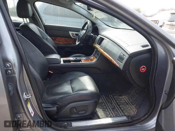 2015 Jaguar XF T Premium with VIN SAJWA0FS1FPU58051, listed as a IAAI auction lot 41690461 with 128,900 mi miles and . Bid and sale history available at DreamBid. Image 5.