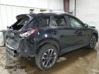 2016 Mazda CX-5 Grand Touring with VIN JM3KE4DY2G0738899, listed as a Copart auction lot 50943255 with 80,807 mi miles and Salvage Title. Bid and sale history available at carsss.com. Image 3.