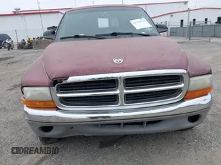 2000 Dodge Dakota Sport with VIN 1B7GG22N4YS709948, listed as a IAAI auction lot 41714352 with 1 mi miles. Bid and sale history available at carsss.com. Image 6.