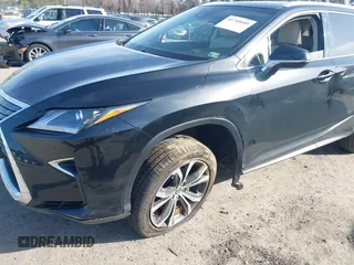 2018 Lexus RX 350L Premium z VIN JTJDZKCA8J2005182, wystawiony jako IAAI lot #41740685 z przebiegiem 113 405 mil mil oraz . Historia ofert i sprzedaży dostępna na DreamBid. Obrazek 6.