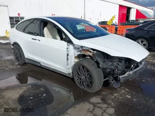 2022 Tesla Model X with VIN 7SAXCDE56NF360208, listed as a IAAI auction lot 41576953 with 9,759 mi miles. Bid and sale history available at carsss.com. Image 1.