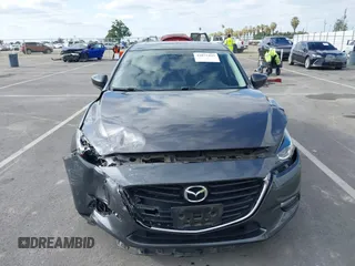2018 Mazda 3 Touring with VIN 3MZBN1L32JM268582, listed as a IAAI auction lot 42072435 with 61,417 mi miles. Bid and sale history available at carsss.com. Image 12.