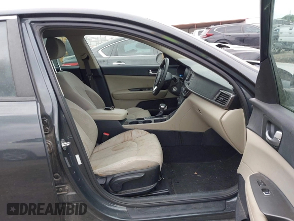 2016 Kia Optima LX with VIN KNAGT4L37G5070799, listed as a IAAI auction lot 41963239 with 116,308 mi miles. Bid and sale history available at carsss.com. Image 5.