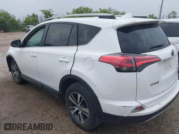 2018 Toyota RAV4 XLE with VIN 2T3WFREV4JW469929, listed as a IAAI auction lot 42536958 with 82,443 mi miles and . Bid and sale history available at DreamBid. Image 3.