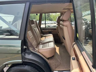 1990 Land Rover Range Rover z VIN SALHV1249LA408661, wystawiony jako Copart lot #59861925 z przebiegiem 129 140 mil mil oraz Czysty tytuł • Clean title. Historia ofert i sprzedaży dostępna na DreamBid. Obrazek 7.