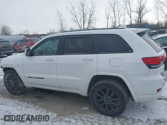 2018 Jeep Grand Cherokee Laredo E with VIN 1C4RJFAG1JC499457, listed as a IAAI auction lot 41379459 with 127,344 mi miles and . Bid and sale history available at DreamBid. Image 15.