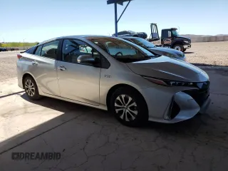 2021 Toyota Prius LE z VIN JTDKAMFP6M3183538, wystawiony jako Copart lot #54267425 z przebiegiem 29 374 mil mil oraz Szkoda całkowita • Salvage title. Historia ofert i sprzedaży dostępna na DreamBid. Obrazek 4.