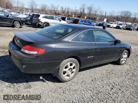 2000 Toyota Solara SE z VIN 2T1CF28P8YC296590, wystawiony jako Copart lot #49839935 z przebiegiem 192 140 mil mil oraz Czysty tytuł • Clean title. Historia ofert i sprzedaży dostępna na DreamBid. Obrazek 3.