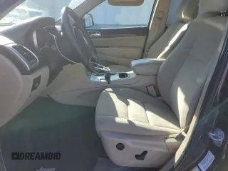2014 Jeep Grand Cherokee Laredo with VIN 1C4RJEAG9EC260562, listed as a Copart auction lot 56496384 with 113,898 mi miles and Salvage Title. Bid and sale history available at carsss.com. Image 7.