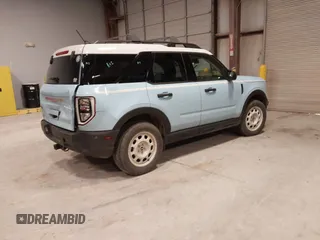 2023 Ford Bronco Sport Heritage z VIN 3FMCR9G63PRD69460, wystawiony jako IAAI lot #41588444 z przebiegiem 29 761 mil mil oraz . Historia ofert i sprzedaży dostępna na DreamBid. Obrazek 4.