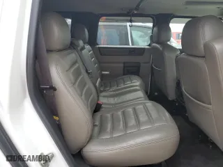 2005 Hummer H2 SUV with VIN 5GRGN23UX5H116341, listed as a Copart auction lot 76877704 with 145,778 mi miles and Salvage Title. Bid and sale history available at carsss.com. Image 11.