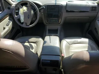 2003 Ford Explorer Eddie Bauer с VIN 1FMDU64K73UB77285, выставлен на аукционе Copart как лот 73601294 с пробегом Не указан миль и Списание • Salvage title. История ставок и продаж доступна на DreamBid. Изображение 8.