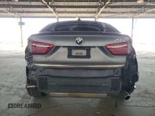 2015 BMW X6 xDrive35i with VIN 5UXKU2C59F0N77312, listed as a Copart auction lot 63591123 with 121,105 mi miles. Bid and sale history available at carsss.com. Image 6.