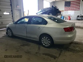 2011 Volkswagen Jetta SE z VIN 3VWDZ7AJ0BM338079, wystawiony jako Copart lot #58900585 z przebiegiem 165 055 mil mil oraz Nie do naprawy • Non repairable. Historia ofert i sprzedaży dostępna na DreamBid. Obrazek 2.