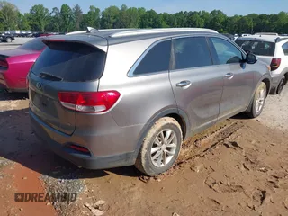 2017 Kia Sorento LX with VIN 5XYPG4A32HG294131, listed as a IAAI auction lot 42079685 with 106,166 mi miles. Bid and sale history available at carsss.com. Image 4.