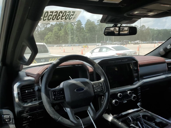 2021 Ford F-150 XL with VIN 1FTEW1C50MFA45654, listed as a Copart auction lot 56936595 with 103,189 mi miles and Salvage title. Bid and sale history available at DreamBid. Image 8.