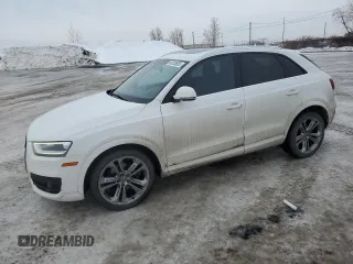 2015 Audi Q3 with VIN WA1EFEFS7FR001414, listed as a Copart auction lot 46528505 with 128,252 mi miles and Salvage title. Bid and sale history available at DreamBid. Image 1.