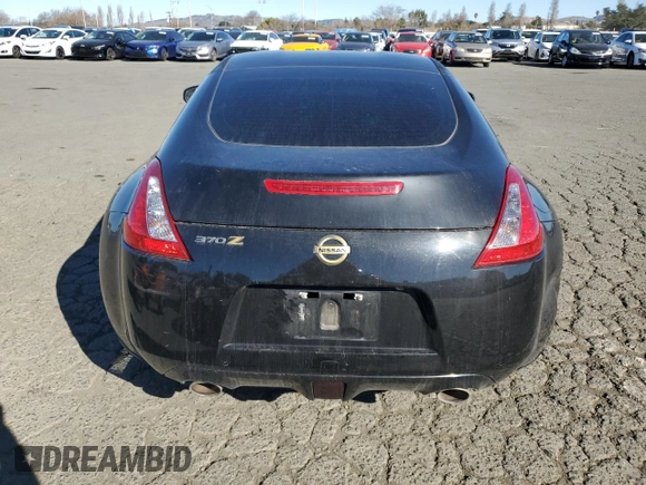 2012 Nissan 370Z Touring with VIN JN1AZ4EH4CM561432, listed as a Copart auction lot 89376935 with 128,955 mi miles and Salvage Title. Bid and sale history available at carsss.com. Image 6.