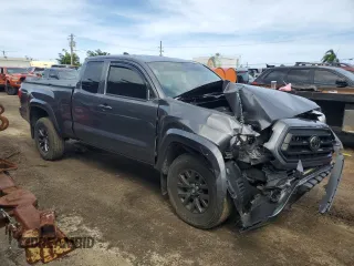 2021 Toyota Tacoma SR z VIN 3TYRX5GN0MT006678, wystawiony jako Copart lot #88664385 z przebiegiem 7 115 mil mil oraz Nie do naprawy • Non repairable. Historia ofert i sprzedaży dostępna na DreamBid. Obrazek 4.