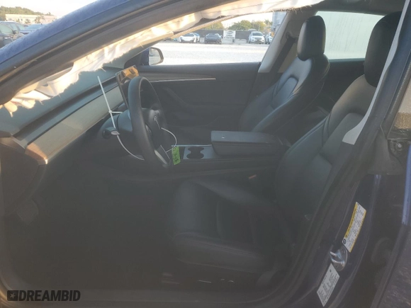 2023 Tesla Model 3 with VIN 5YJ3E1EA9PF448559, listed as a Copart auction lot 48233945 with 0 mi miles and Salvage Title. Bid and sale history available at carsss.com. Image 7.