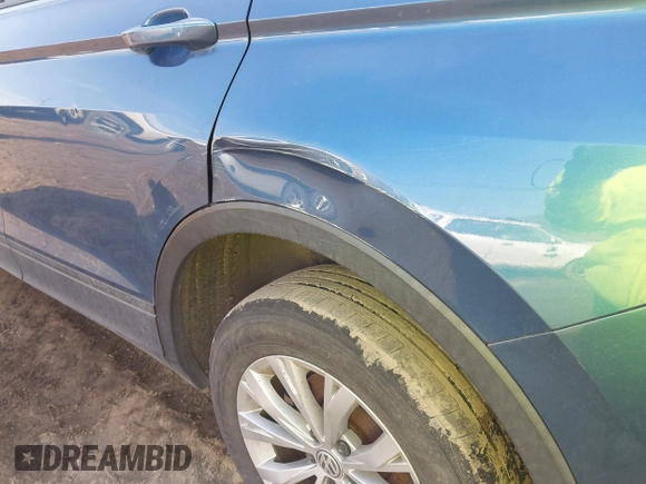 2018 Volkswagen Tiguan S with VIN 3VV1B7AX6JM108786, listed as a IAAI auction lot 41708099 with 162,289 mi miles and . Bid and sale history available at DreamBid. Image 19.