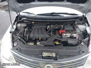 2009 Nissan Versa 1.8 SL with VIN 3N1BC13E59L420840, listed as a IAAI auction lot 41503232 with 129,824 mi miles. Bid and sale history available at carsss.com. Image 10.