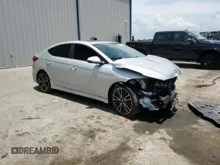 2018 Hyundai Elantra Sport с VIN KMHD04LB8JU556486, выставлен на аукционе Copart как лот 58772815 с пробегом 105 307 миль миль и Списание • Salvage title. История ставок и продаж доступна на DreamBid. Изображение 13.