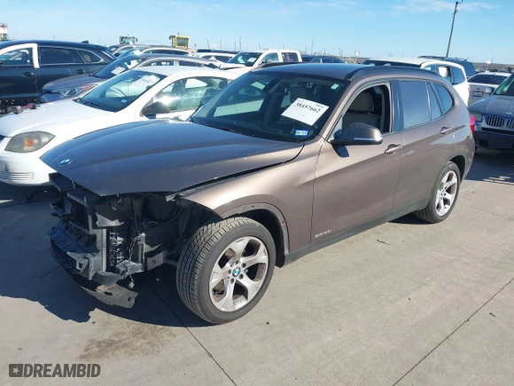 2013 BMW X1 28i with VIN WBAVM1C5XDVW42366, listed as a IAAI auction lot 38457662 with 107,116 mi miles. Bid and sale history available at carsss.com. Image 18.