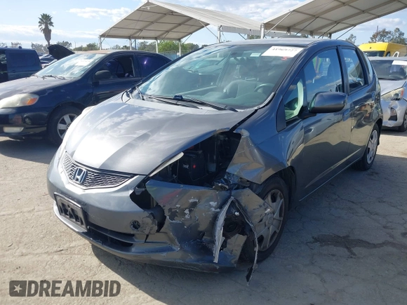 2013 Honda Fit with VIN JHMGE8H36DC056640, listed as a IAAI auction lot 41969727 with 94,564 mi miles. Bid and sale history available at carsss.com. Image 2.