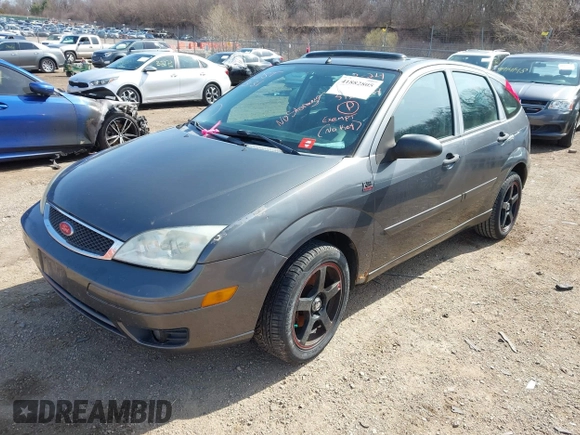 2007 Ford Focus S z VIN 1FAHP37N17W316344, wystawiony jako IAAI lot #41882805 z przebiegiem 262 422 mil mil oraz . Historia ofert i sprzedaży dostępna na DreamBid. Obrazek 2.