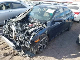 2017 Honda Civic Sedan EX-L with VIN 19XFC1F70HE005116, listed as a IAAI auction lot 42042277 with 61,812 mi miles. Bid and sale history available at carsss.com. Image 2.