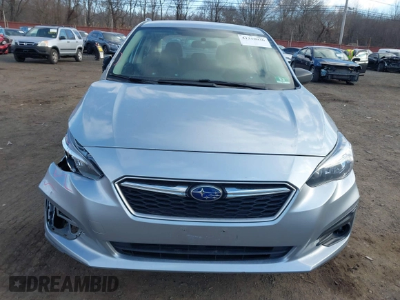 2018 Subaru Impreza with VIN 4S3GKAA67J3622063, listed as a IAAI auction lot 41318036 with 75,713 mi miles and . Bid and sale history available at DreamBid. Image 12.
