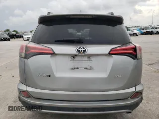 2018 Toyota RAV4 XLE with VIN 2T3WFREV2JW446388, listed as a Copart auction lot 54000675 with Not Provided miles and Salvage Title. Bid and sale history available at DreamBid. Image 6.
