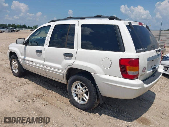 2004 Jeep Grand Cherokee Laredo with VIN 1J4GX48S94C222249, listed as a IAAI auction lot 42598242 with 196,745 mi miles and . Bid and sale history available at DreamBid. Image 3.
