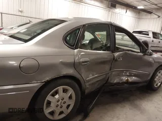2006 Ford Taurus SE with VIN 1FAFP53U86A113947, listed as a IAAI auction lot 41753927 with 203,867 mi miles. Bid and sale history available at carsss.com. Image 6.