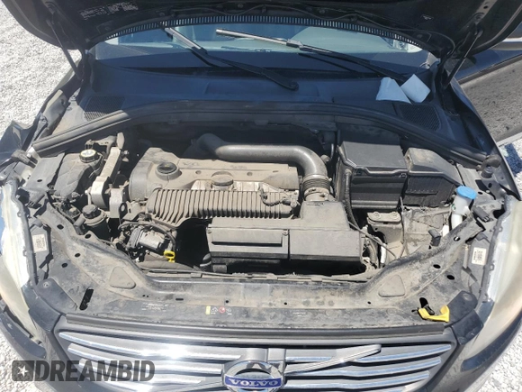 2015 Volvo XC60 T5 z VIN YV4612RK7F2716797, wystawiony jako Copart lot #58010425 z przebiegiem 49 647 mil mil oraz Szkoda całkowita • Salvage title. Historia ofert i sprzedaży dostępna na DreamBid. Obrazek 12.