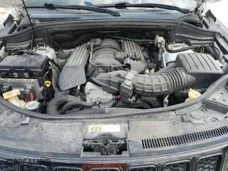 2015 Jeep Grand Cherokee SRT with VIN 1C4RJFDJ3FC918942, listed as a Copart auction lot 52078175 with 115,964 mi miles and Salvage Title. Bid and sale history available at carsss.com. Image 12.