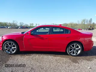 2015 Dodge Charger SXT with VIN 2C3CDXHGXFH858399, listed as a IAAI auction lot 42090958 with 71,488 mi miles and . Bid and sale history available at DreamBid. Image 14.