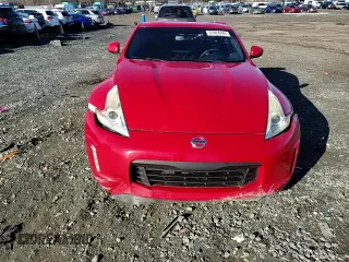 2014 Nissan 370Z Nismo with VIN JN1AZ4EH7EM630228, listed as a Copart auction lot 87024444 with 88,456 mi miles and Salvage title. Bid and sale history available at DreamBid. Image 11.
