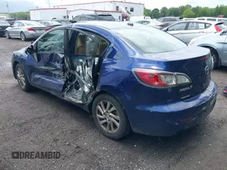 2012 Mazda 3 i Grand Touring with VIN JM1BL1W86C1682545, listed as a IAAI auction lot 42650042 with 101,803 mi miles and . Bid and sale history available at DreamBid. Image 3.